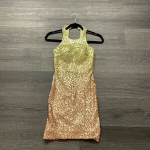 Like new homecoming dress color gold/rose gold, size 00
